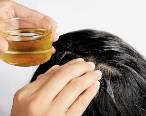 chăm sóc tóc dài nhanh bằng dầu dừa